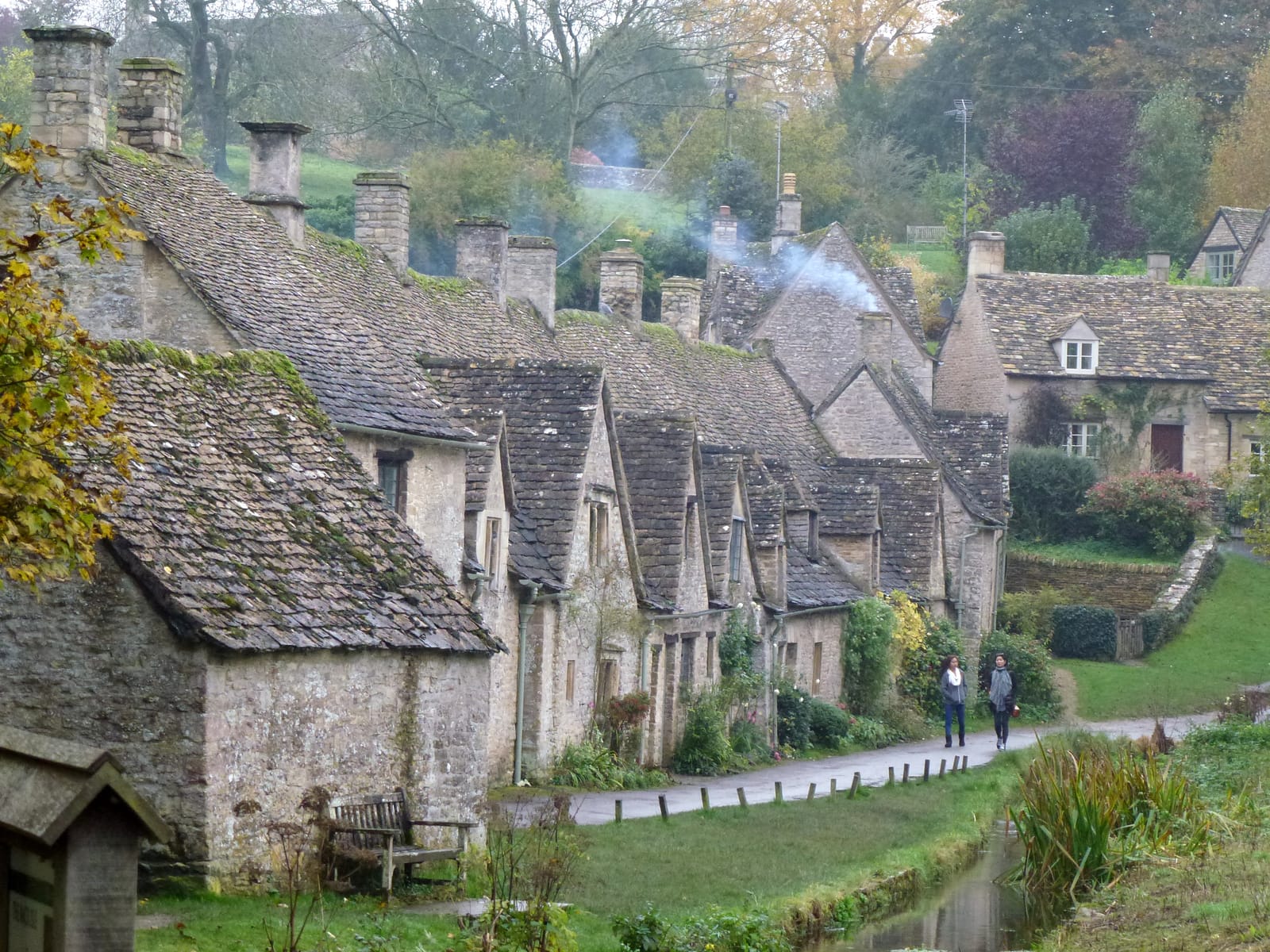 Arlington Row, a terrace of honey-coloured stone cottages in Bibury, the Cotswolds