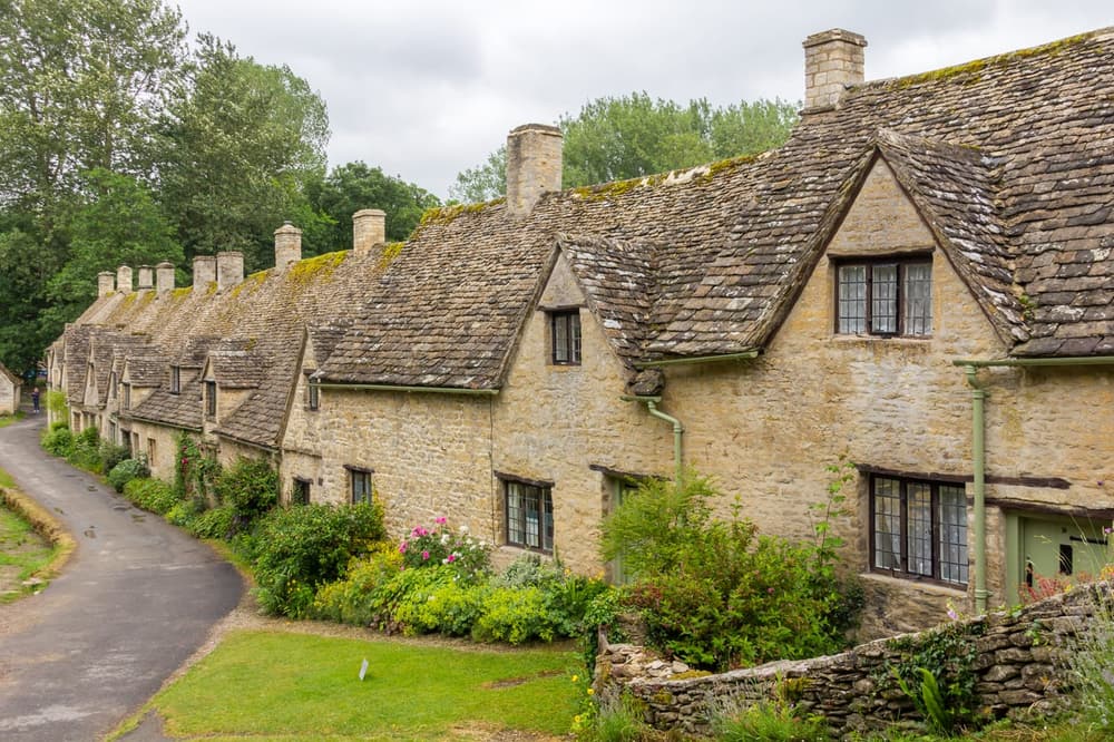 Honey-coloured stone cottages of Arlington Row in Bibury, the Cotswolds
